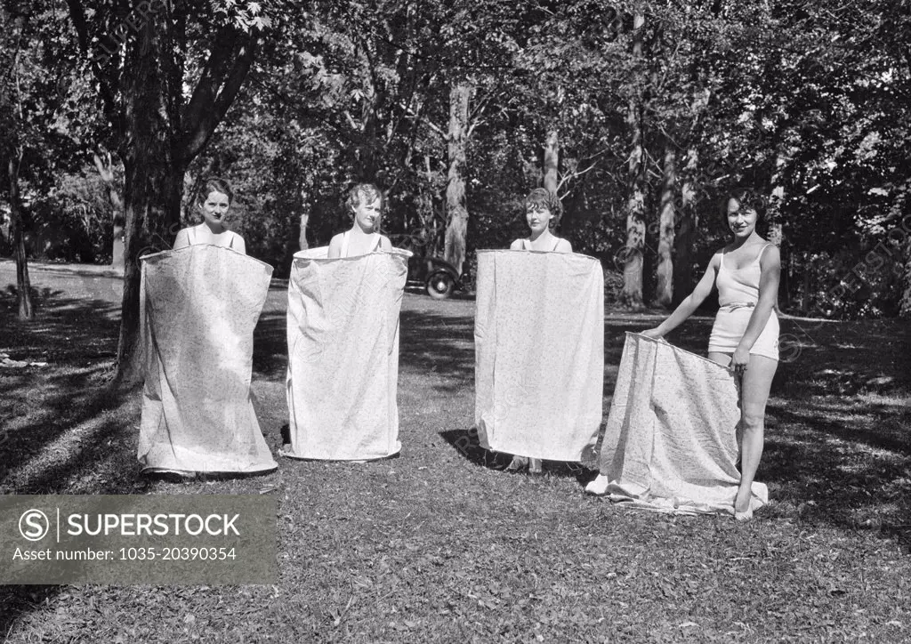 Walla Walla, Washington:  c. 1935 Women using their portable bath houses with them so that they can change into bathing suits at any time they choose.