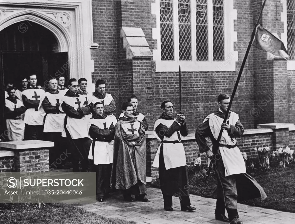 London, England:  c. 1928 Dockland representatives of the Noble Order of Crusaders in procession at the opening service of the new Dockland Chapel of St. George and St. Helena.