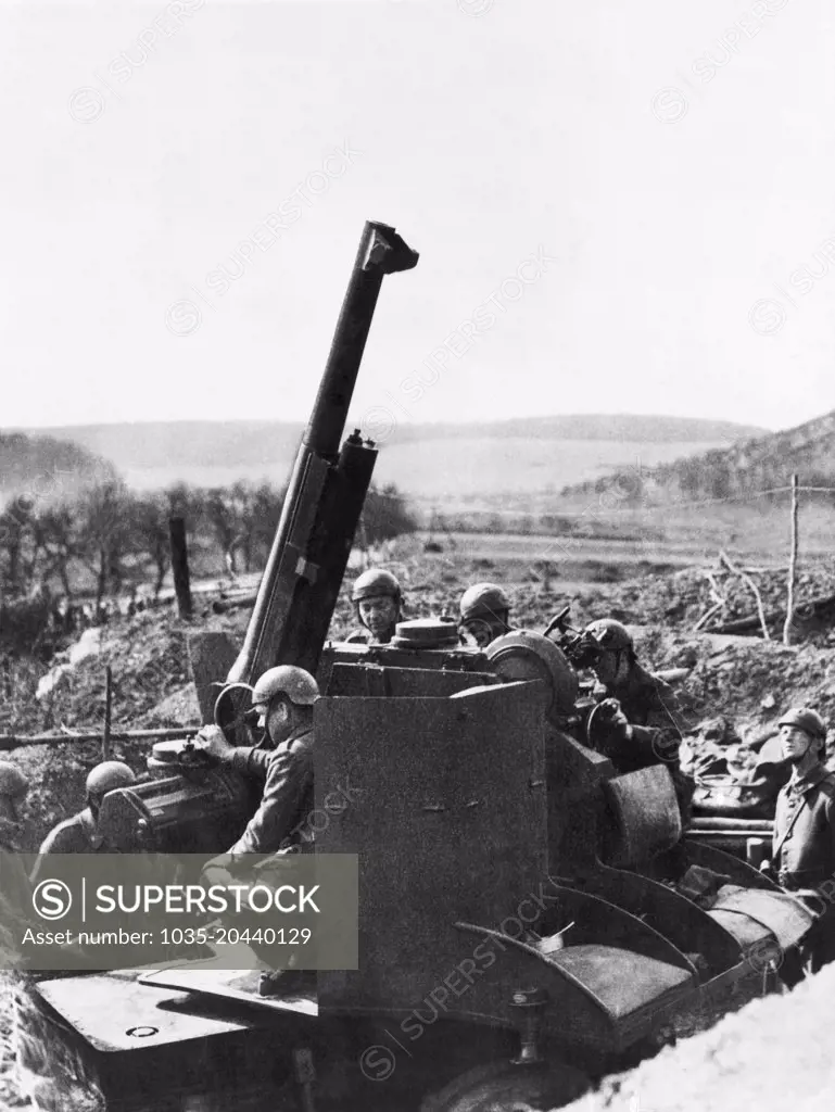 Maginot Line, France:  April 5, 1940 French soldiers man an anti-aircraft gun to disourage German reconnaissance planes in the vicinty of the Maginot line.