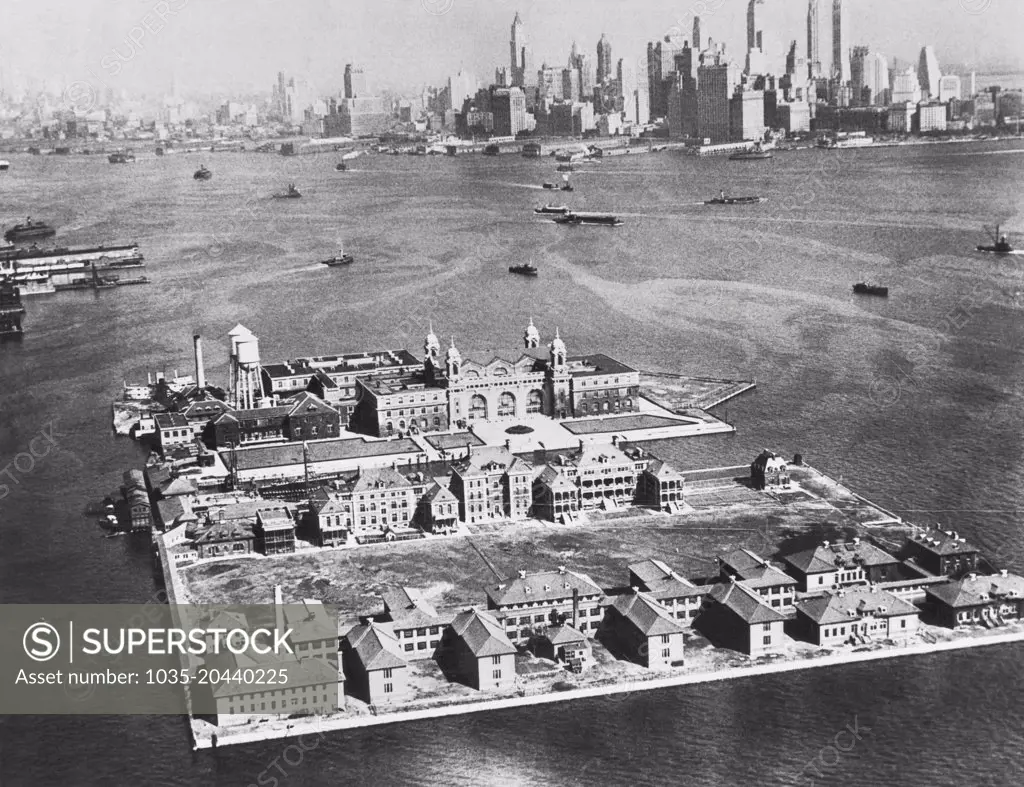 New York, New York:  October 18, 1933.  The Gateway to America is this tiny island in the middle of New York Harbor. Every immigrant to the East Coast of the United States is held for examination on Ellis Island. There are barracks for those who are detained.