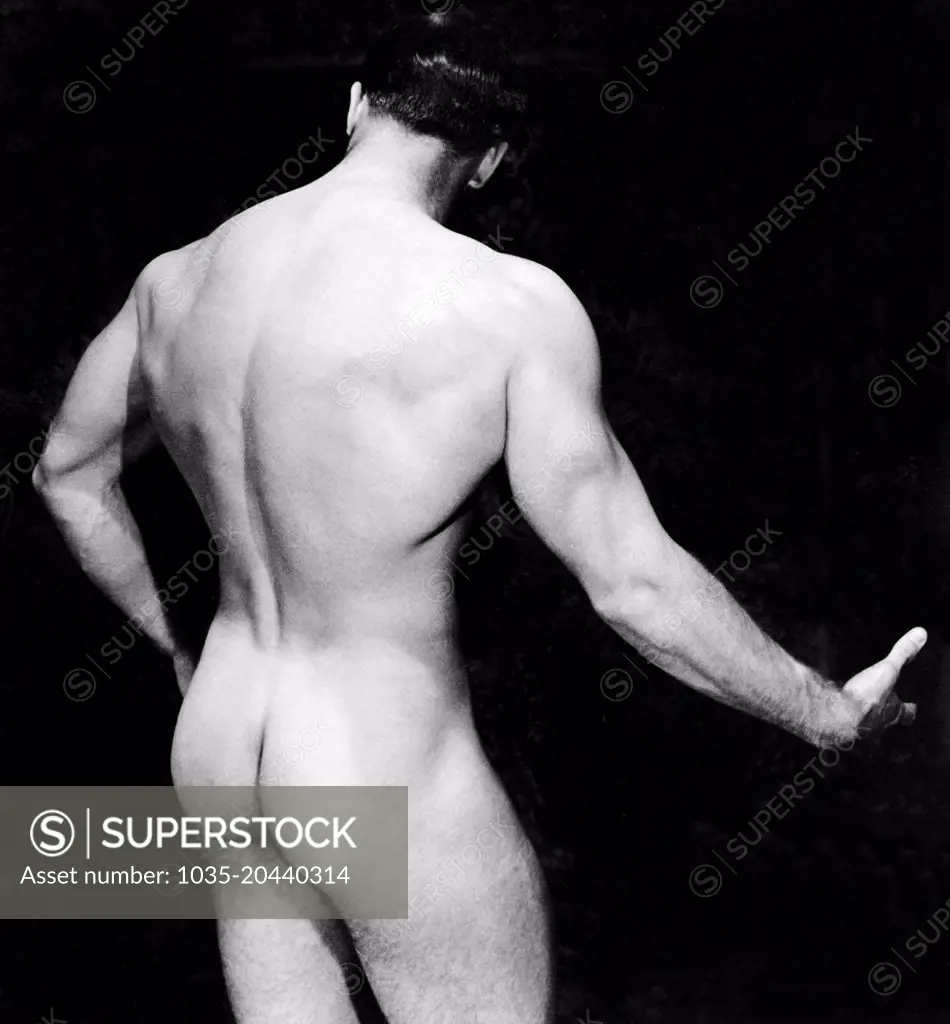 San Francisco, California:   c. 1950 A male bodybuilder poses nude from the back.