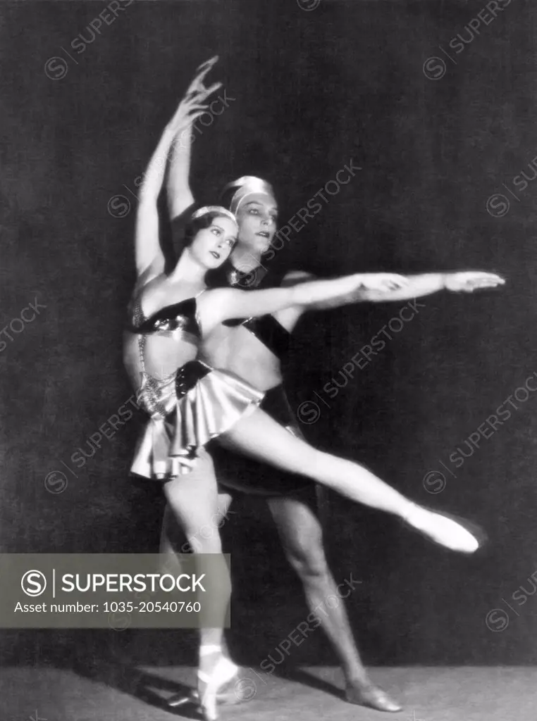 Italy:  September 1, 1935 Two members of the Richetr Ballet Company performing a pas de deux on stage.