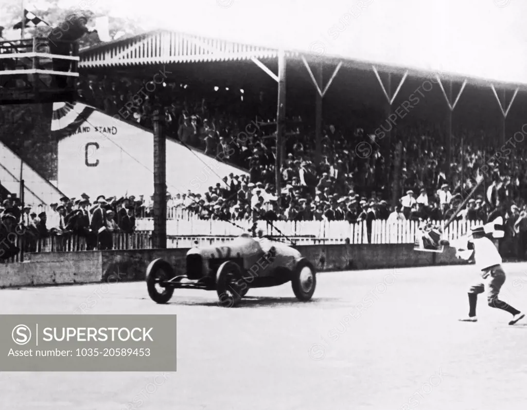 Indianapolis, Indiana:  June 1, 1925 Peter De Paolo was the victor in the indy 500 race this year with a record speed of 101.13 mph. He is the nephew of racecar driving champion Ralph De Palma.