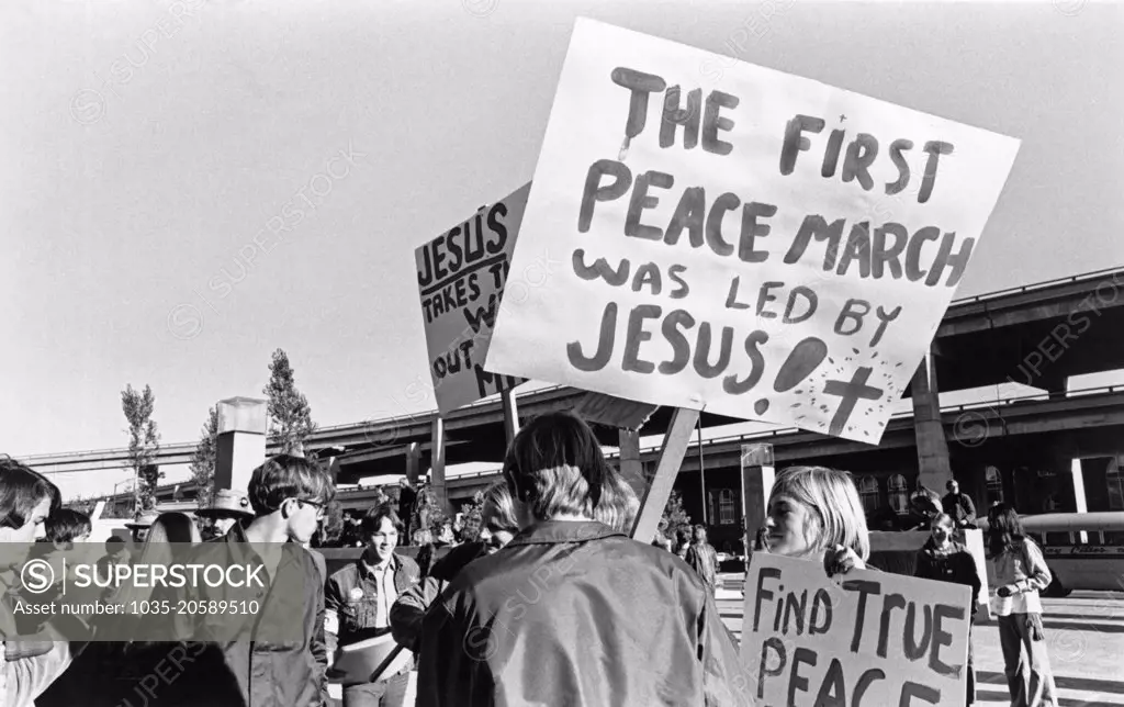 San Francisco, California:  c. 1968 People at a demonstration in Justin Herman Plaza protesting the war in Vietnam.