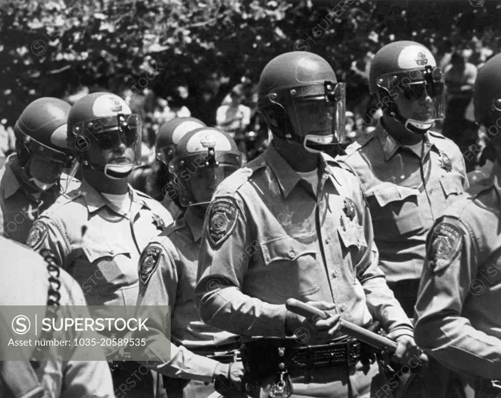 Berkeley, California:  May, 1969 UC police in riot gear in formation at Sproul Plaza on the Univerity of California campus on the first day of confrontations with the students.