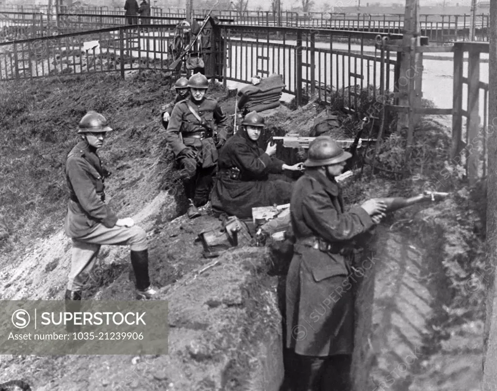 Ruhr District, Germany:  April 6, 1920 Belgian troops on guard at a Rhine River bridgehead in the Ruhr District where the Germans are now fighting the communists in the neutral zone
