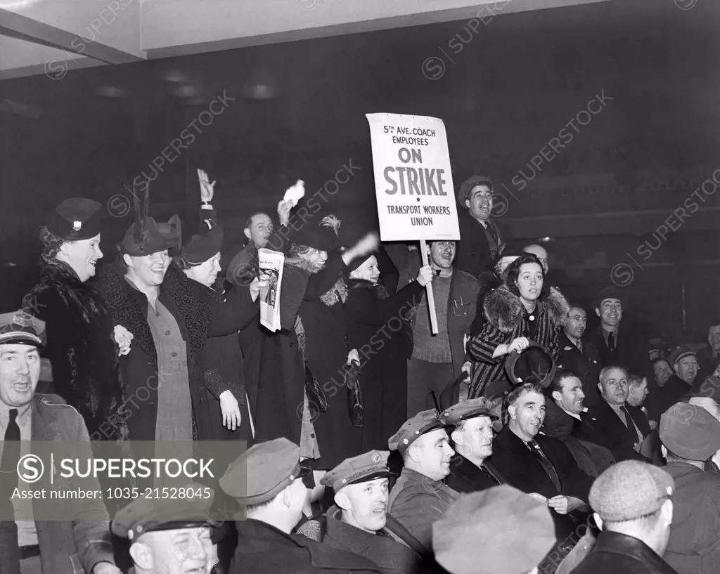 New York, New York:   1937 Fifth Avenue coach employees of the Transit Workers Union at a bus strike union meeting.