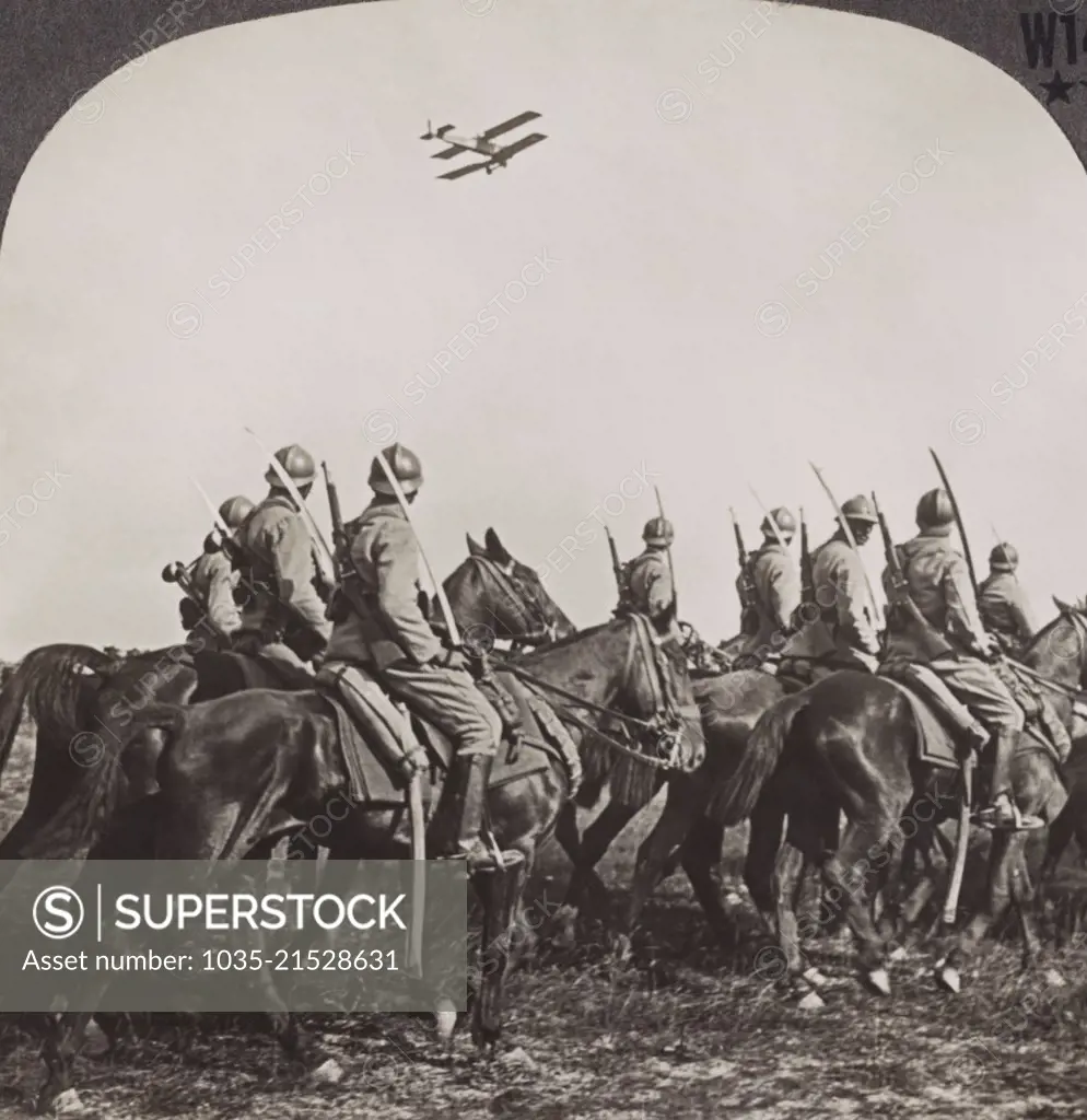 France:  c. 1916 French cavalry and army airplanes scouting the landscape for the enemy during WWI.