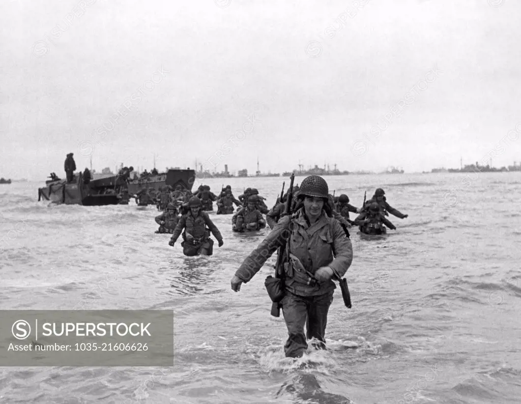 Normandy, France:  June 13, 1944 Allied reinforcement troops landing on Normandy beaches during the invasion of France a week after D-Day.