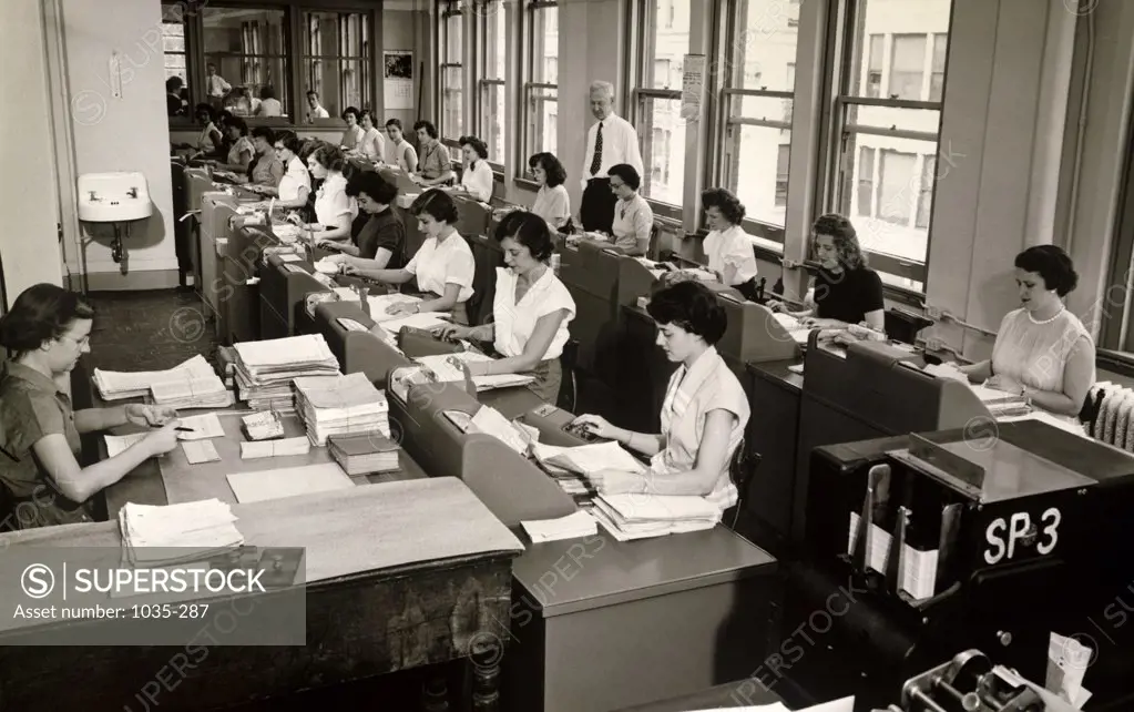 High angle view of a group of women working in an office, Punch Unit Data Processing Center