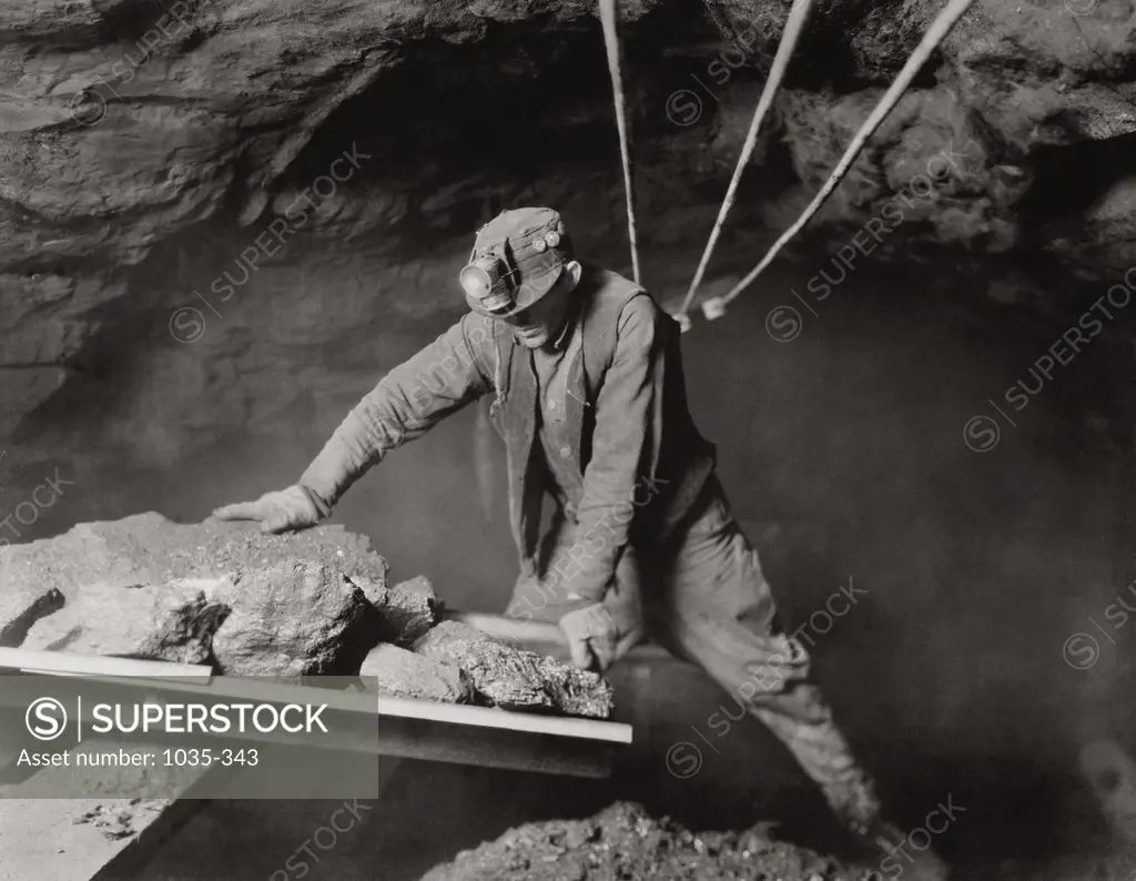 Miner working in a coal mine