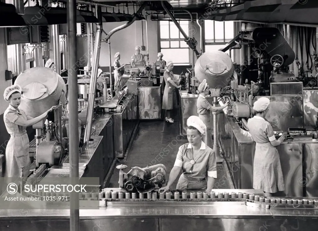 Group of female workers working in a factory, Heinz Company