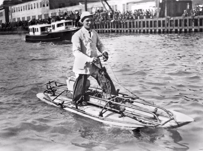 San Francisco, California:   October 29, 1923. Inventor A.N Sheldon walks across San Francisco Bay on his pontoon water skis. It took him and his brother 3 hours to traverse the Bay from San Francisco to Oakland. He has been working on perfecting his invention since 1912.