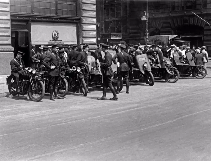 New York, New York:  c. 1927 A New York City armoured motorcycle squad at the ready in case of trouble due to a rally in Union Square of Sacco-Vanzetti sympathizers.