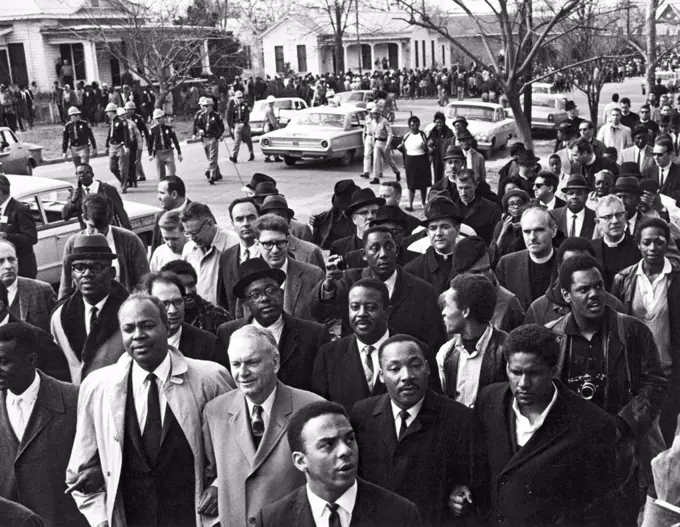 Selma, Alabama:  March 9, 1965 Dr. Martin Luther KIng, second from right, leading the voter protest march in Salma. Behind King is the Rev. Ralph D. Abernathy and King aide Andrew Young is in front of him.
