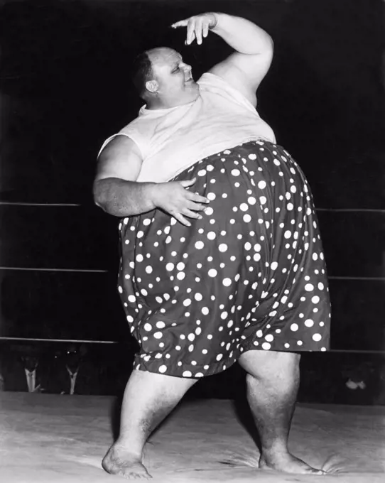 United States:  c. 1956 A portrait of professional wrestler William Cobb, better known as Happy Humphrey. He was the heaviest professional wrestler of all time, averaging 750 pounds during his career with one occasion of weighing in at over 900 pounds.