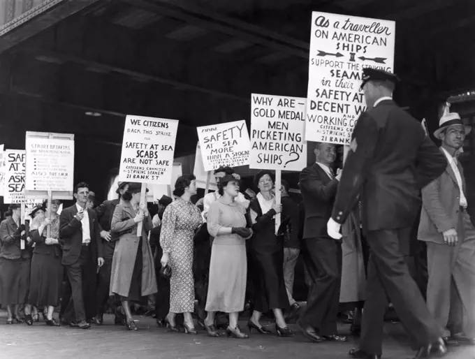 New York, New York:   1936 Workers and citizen supporters on the picket line in front of the Grace Line Pier during the seamen's waterfront strike.