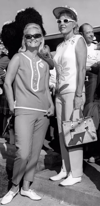 Palm Springs, California:  c. 1967 Two women wearing fashionable golf wear at the Desert Golf Classic.