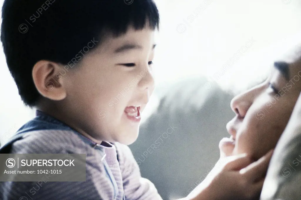 Close-up of a boy with his father