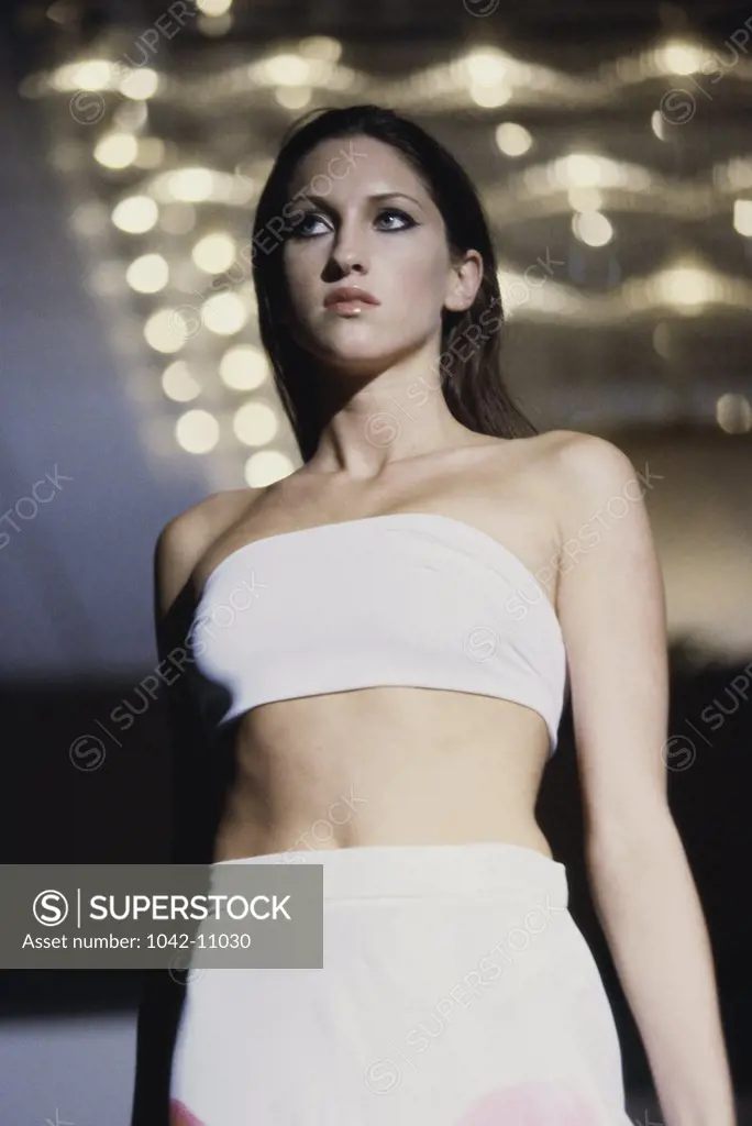 Low angle view of a female fashion model wearing a tube top