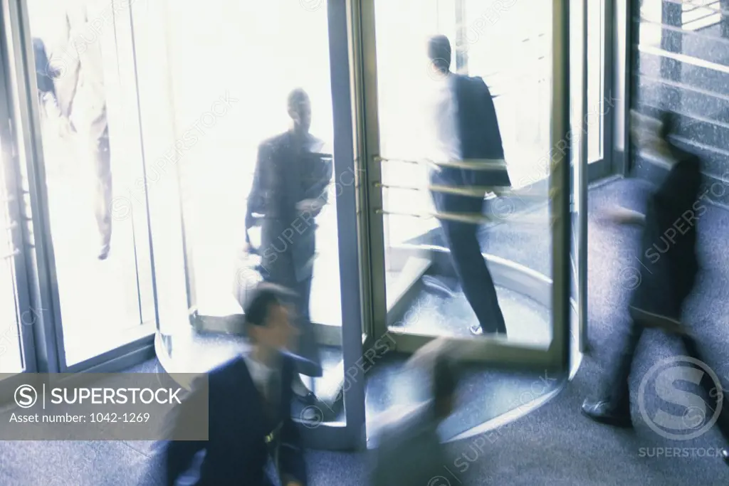High angle view of business executives in a revolving door