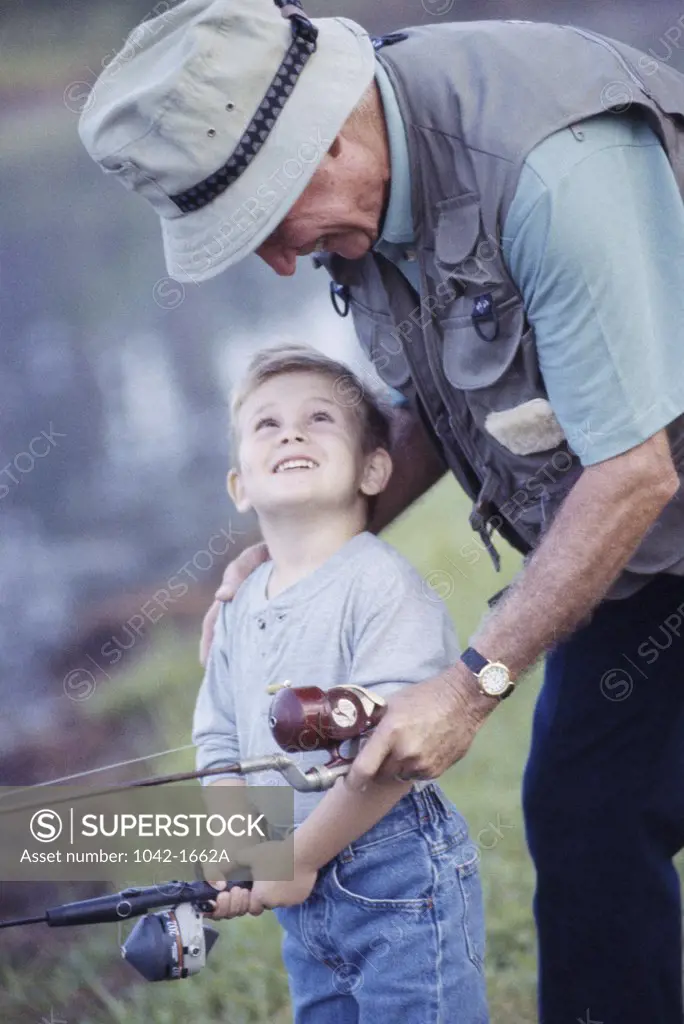 Grandfather and his grandson fishing