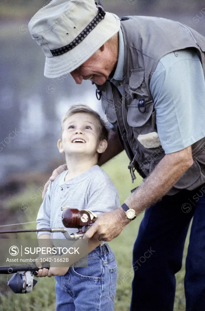 Grandfather and his grandson fishing