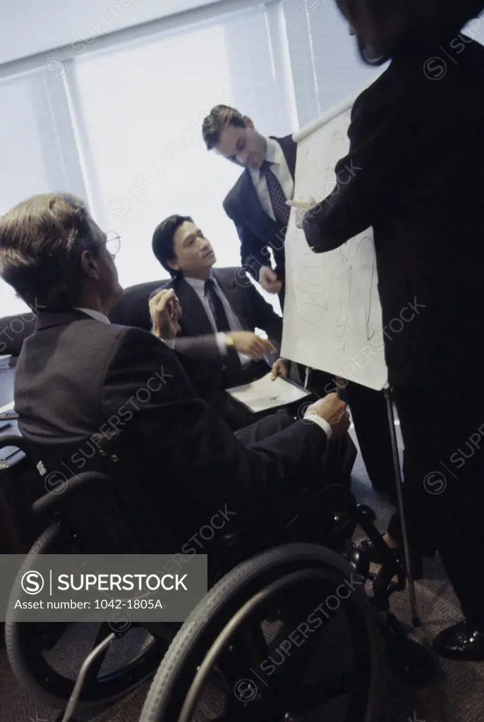 Business executives talking in an office