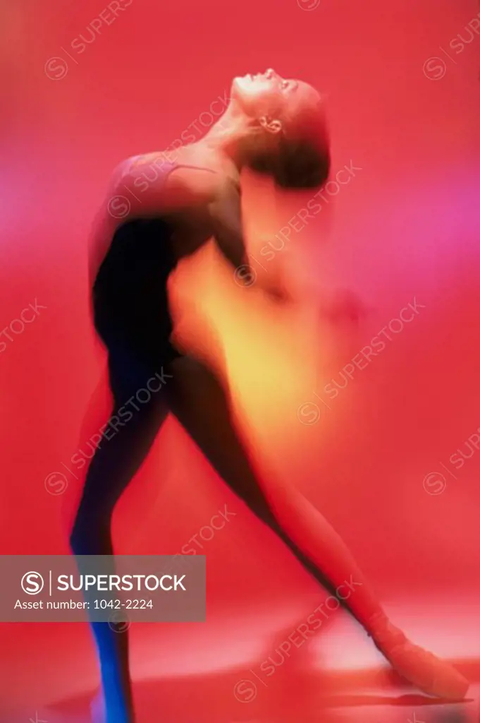Side profile of a ballerina dancing