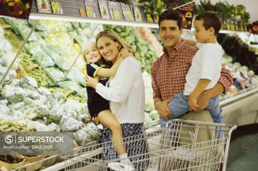 Portrait of a family at a supermarket