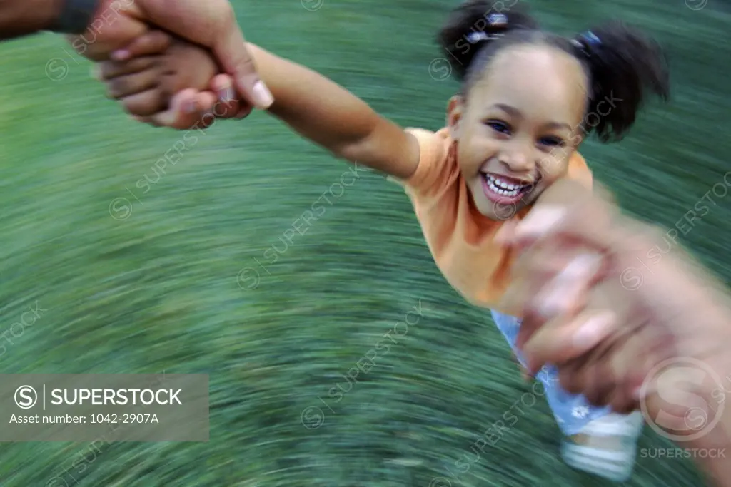 Person spinning a girl