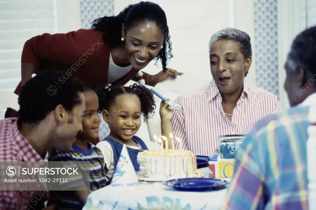 Three generation family celebrating a birthday