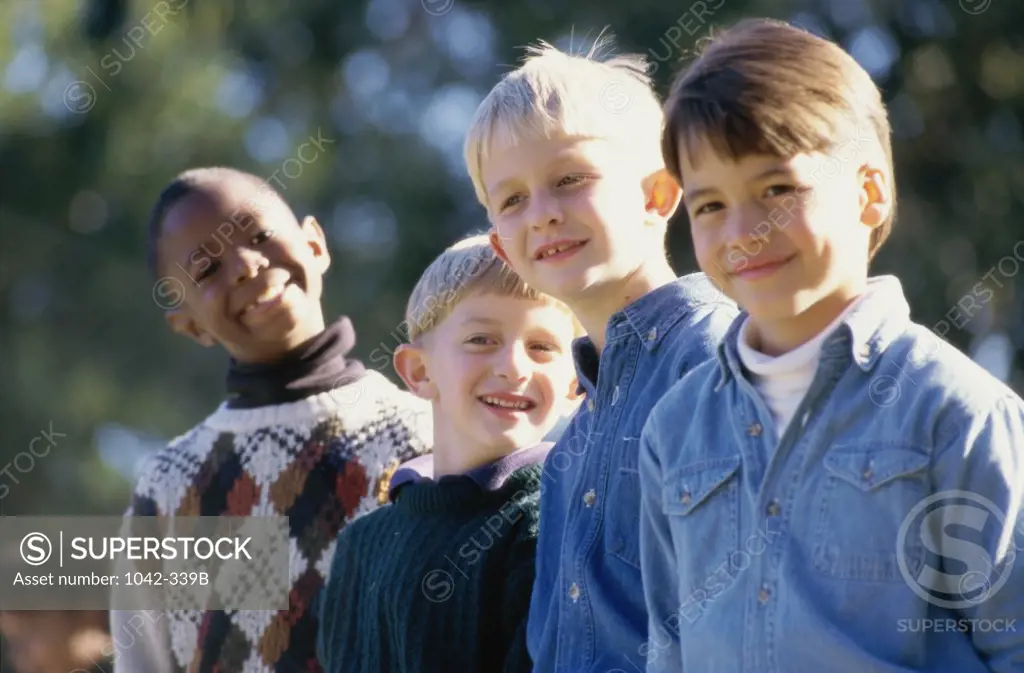 Close-up of a group of boys standing together