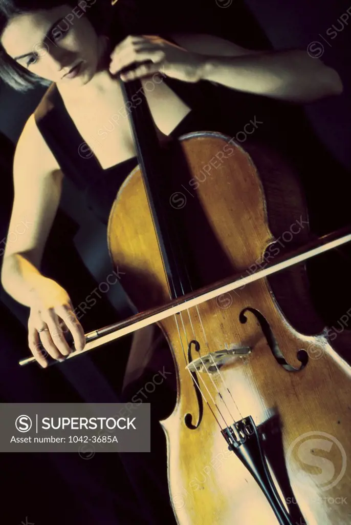 Young woman playing the cello