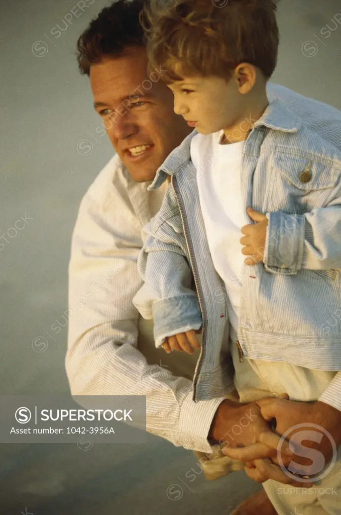 Father holding his son