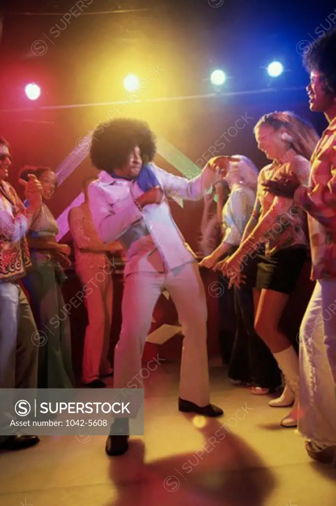 Group of people dancing in a nightclub