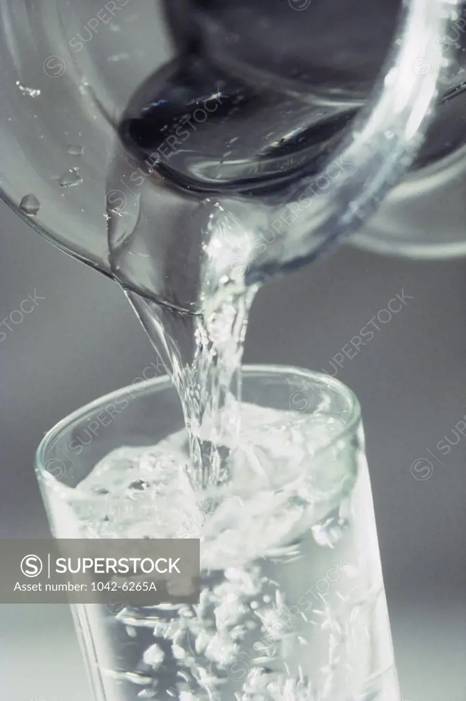 Close-up of water being poured into a glass