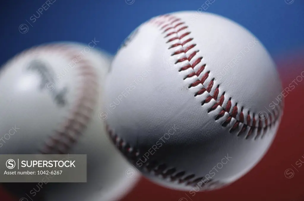 Close-up of two baseballs