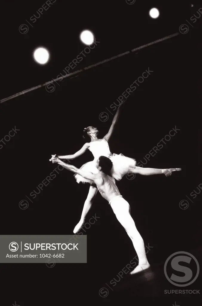 Low angle view of ballet dancers performing