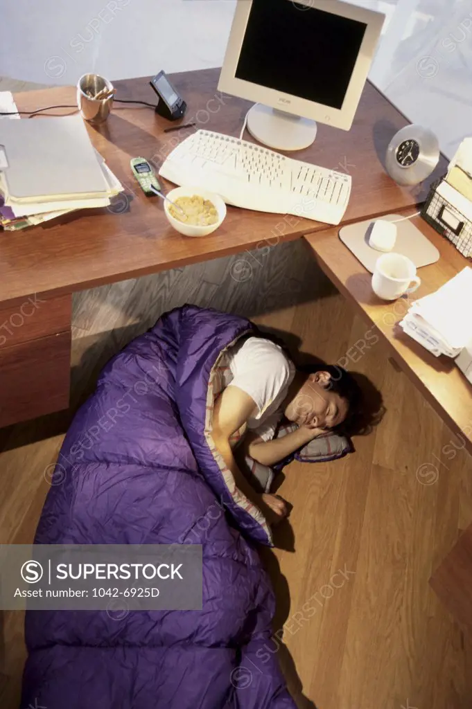 Businessman sleeping in the office