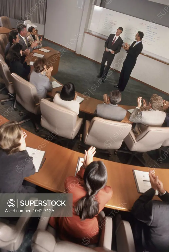 High angle view of a group of business executives in a conference room