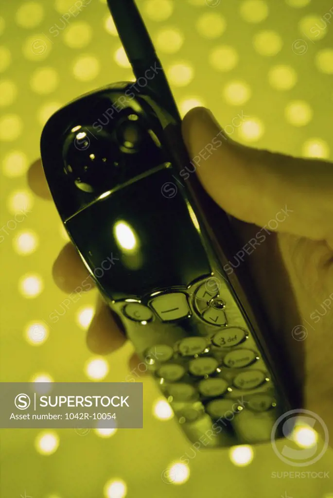 Person holding a mobile phone