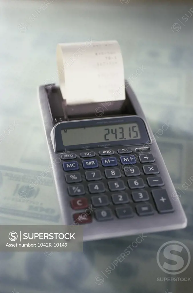 Calculator on American dollar bills