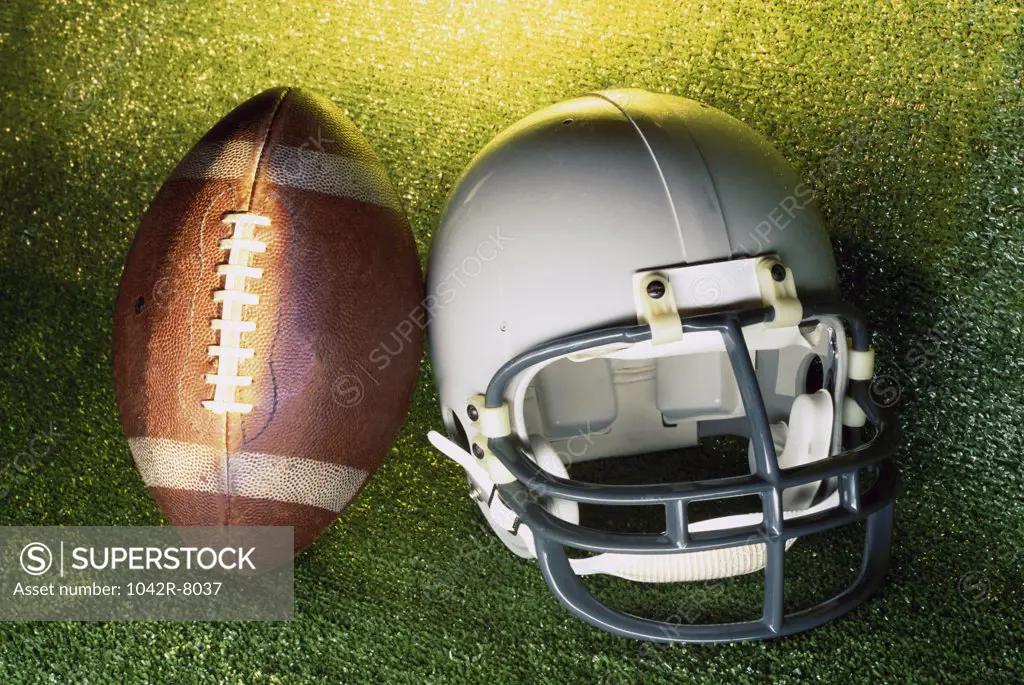 American football helmet and a football