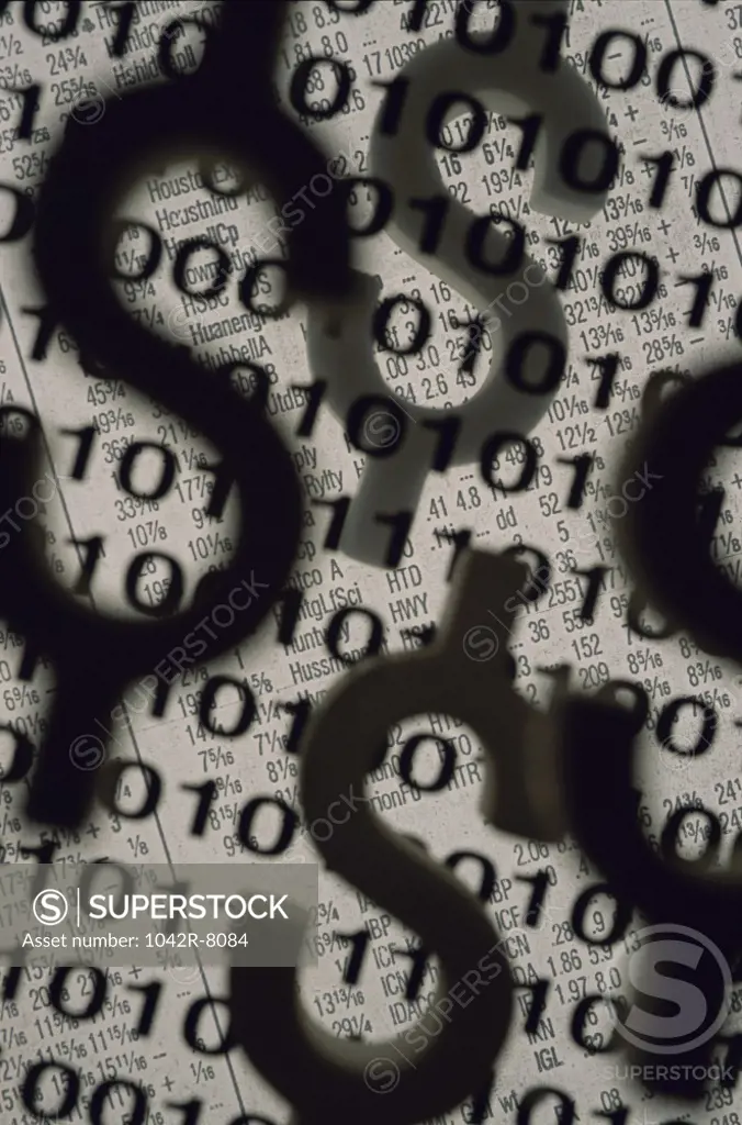 Dollar signs superimposed over binary code