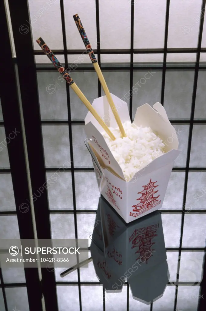 White rice in a takeout box