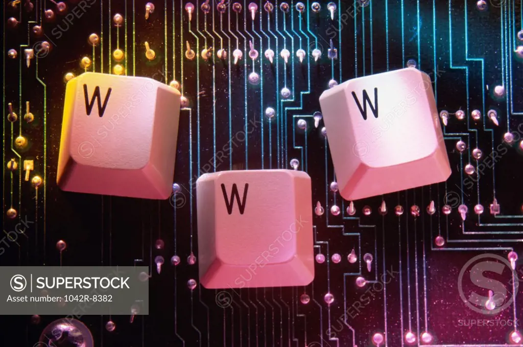 WWW keys of a computer keyboard over a circuit board