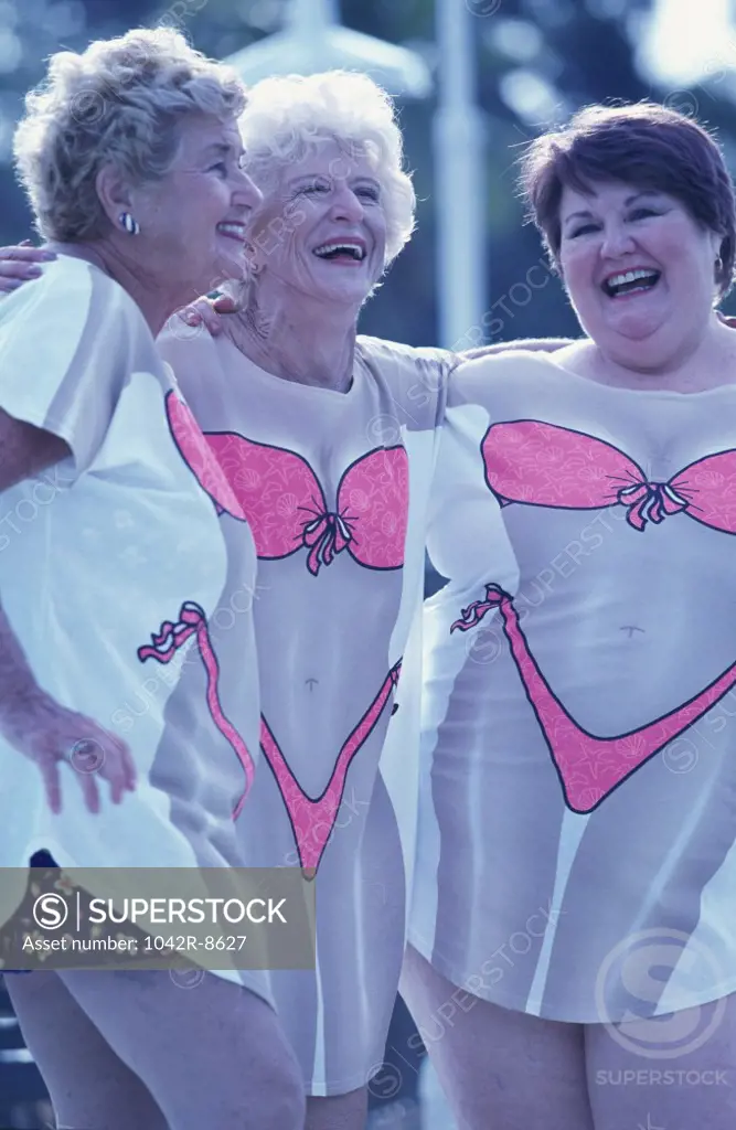 Three senior women laughing