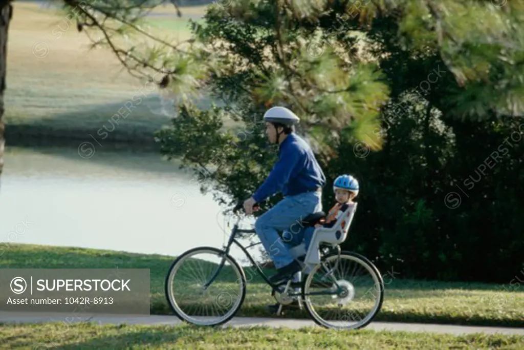 Father and son on a bicycle