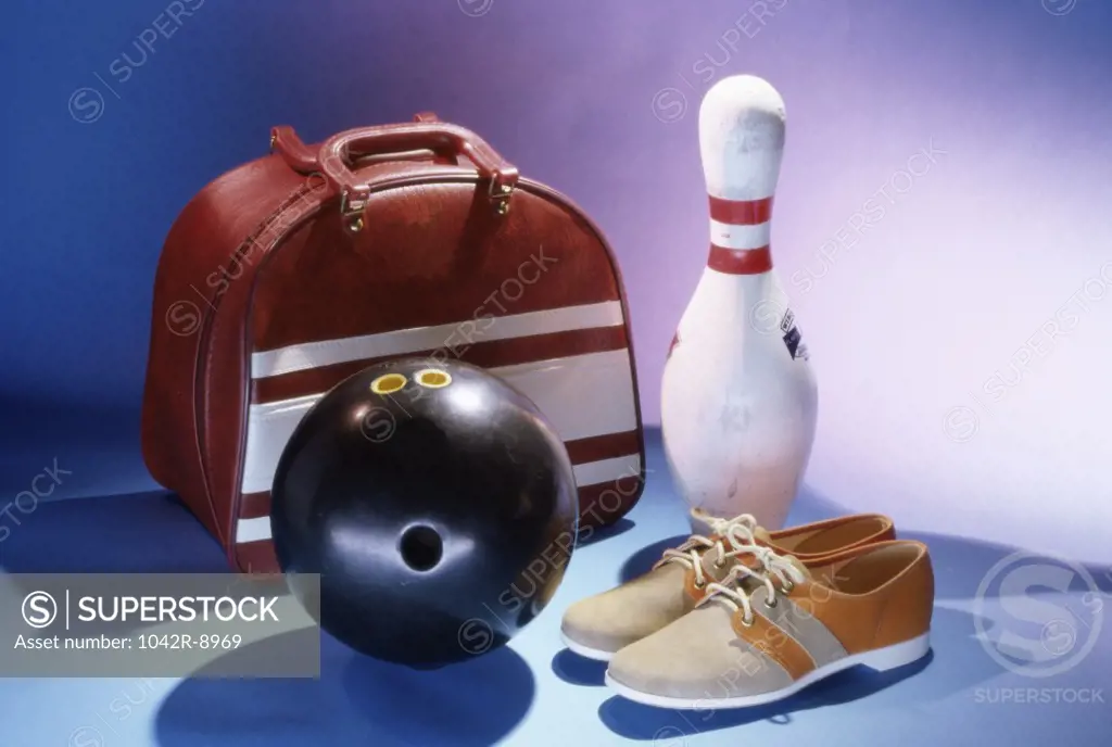 Bowling ball with a bowling pin and bowling shoes
